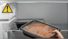 El peligro de guardar un táper caliente en el refrigerador.