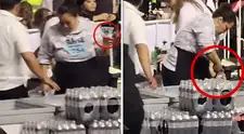 Repartidora es captada recogiendo sobras de cerveza en concierto y desata indignación