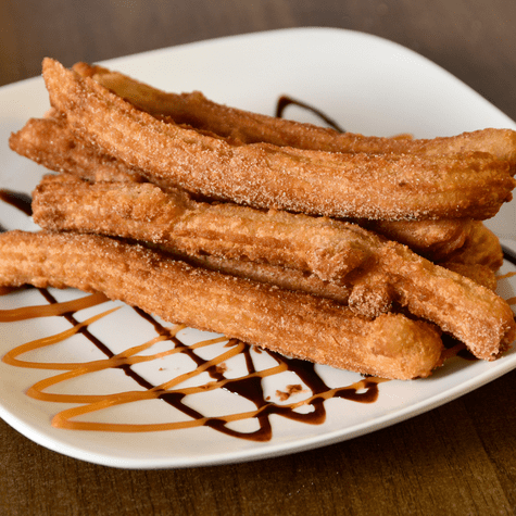Disfruta de unos deliciosos churros hechos en casa. Disfruta de unos deliciosos churros hechos en casa.