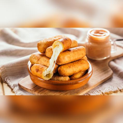 En lugar de un pan con chollo, disfruta de este tequeño con pollo y cebollín. Fuente: Shutterstock. En lugar de un pan con chollo, disfruta de este tequeño con pollo y cebollín. Fuente: Shutterstock.