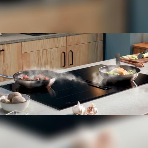 Placa de inducción con extractor integrado: elimina la necesidad de campanas y reduce el ruido en la cocina.   Placa de inducción con extractor integrado: elimina la necesidad de campanas y reduce el ruido en la cocina.