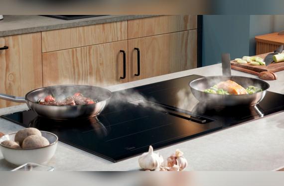  Placa de inducción con extractor integrado: elimina la necesidad de campanas y reduce el ruido en la cocina. 