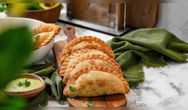 Empanadas de "Toma", negocio junto a su hijo Manolo. Fuente: "Toma".   
