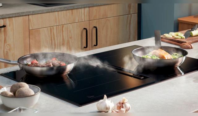 Placa de inducción con extractor integrado: elimina la necesidad de campanas y reduce el ruido en la cocina. Placa de inducción con extractor integrado: elimina la necesidad de campanas y reduce el ruido en la cocina.